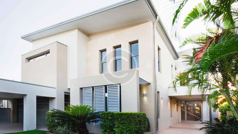 A House with a Massive, Undulating, Wave-Like Exterior